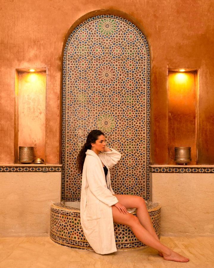 提奇达高尔夫宫酒店-罗莱夏朵 阿加迪尔 外观 照片 A woman in a hammam